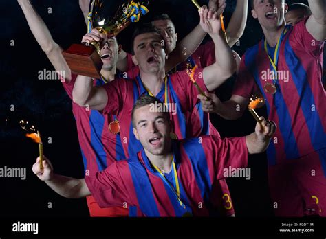 Soccer Players Celebrating Victory Stock Photo Alamy