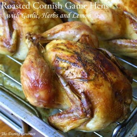 A cornish hen is sometimes referred to as a cornish game hen and it looks just like a miniature chicken. Roasted Garlic, Herb and Lemon Cornish Game Hens | Recipe ...