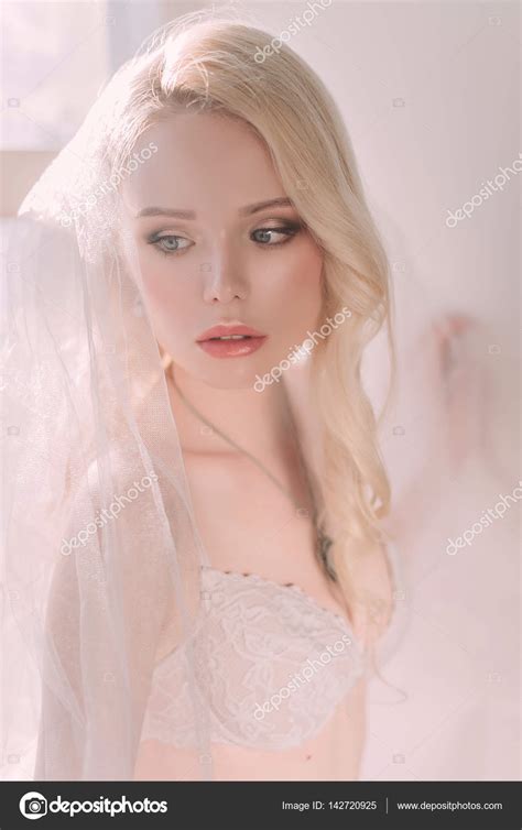 Beautiful Sexy Lady In Elegant White Lingerie Wearing Wedding Veil