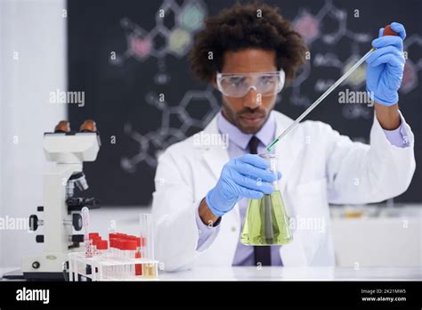 Scientist Conducting An Experiment Hi Res Stock Photography And Images