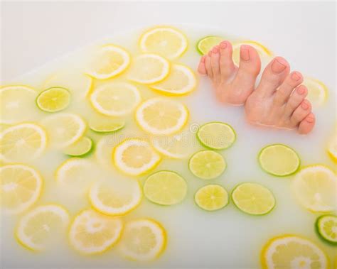 Girl Takes A Milk Bath With Lemons And Limes Citrus Spa Body Care