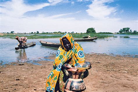 More images for liptako gourma map » A villager takes extra precautions to keep her supply of ...