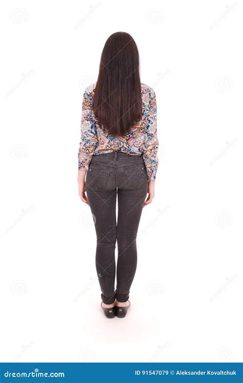 Back View Of Standing Young Beautiful Woman In Jeans Girl Watching