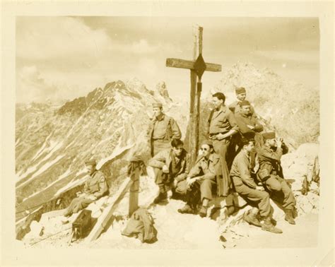 Members Of The Seventh Army Sitting On A Mountain Top The Digital