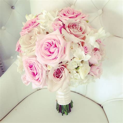 mix of soft pinks creams and blush bridal bouquet