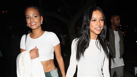 watch karrueche tran smiles and hugs christina milian after their girls night out following