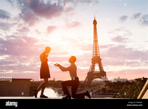 Romantic Marriage Proposal At Eiffel Tower Paris France Stock Photo