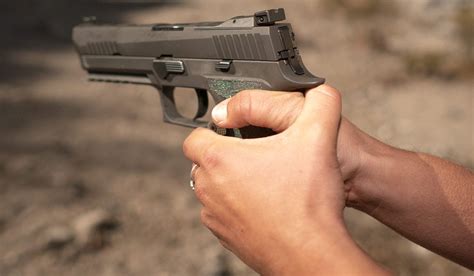 How To Hold A Handgun Guide To Grip Guns Com