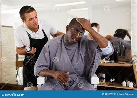 African Man Unpleasantly Surprised By Haircut Stock Photo Image Of