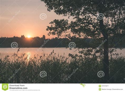 Beautiful Summer Sunset At The Lake With Blue Sky Red And Orang Stock