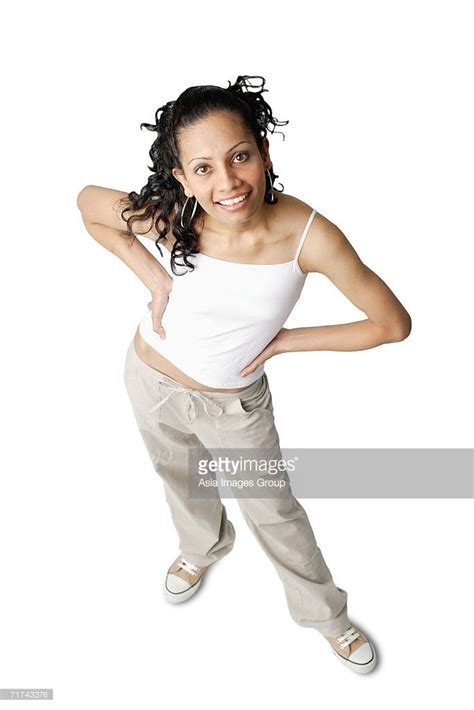 Woman Looking At Camera Smiling Hands On Hip Female Pose Reference Human Poses Reference