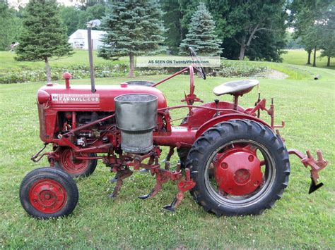 International Farmall Cub And Cultivators And Double Side Dresser