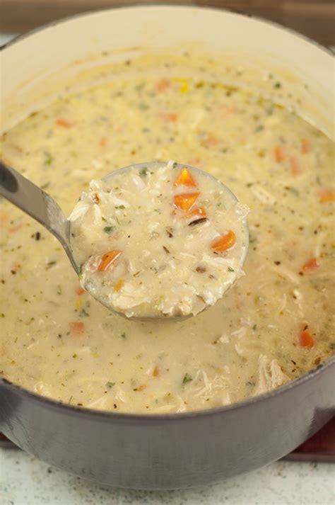 Add the pepper, oregano, bay leaves, parsley, garlic powder, onion flakes, poultry seasoning and shredded chicken. Copycat Panera Chicken & Wild Rice Soup | Wishes and Dishes