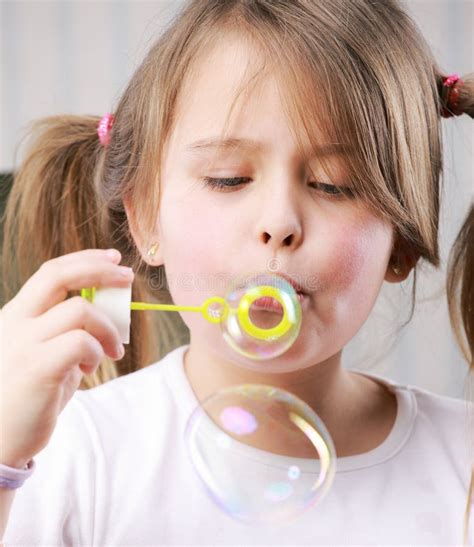 Little Girll Blowing Bubbles Stock Photos Free And Royalty Free Stock