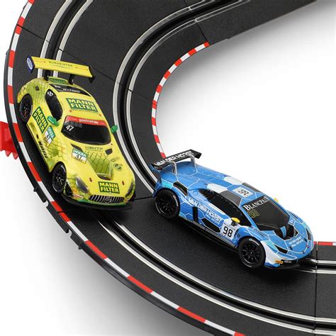 carrera digital electric slot car racing track set includes two cars two dual speed d124 born