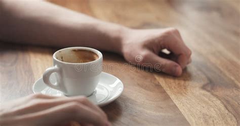 Young Man Hand With Coffee Cup Waiting Tapping Fingers Sitting At The