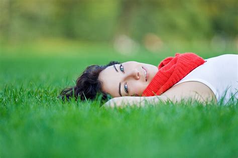 Beautiful Woman Lying Down In Park License Image 70391070 Lookphotos