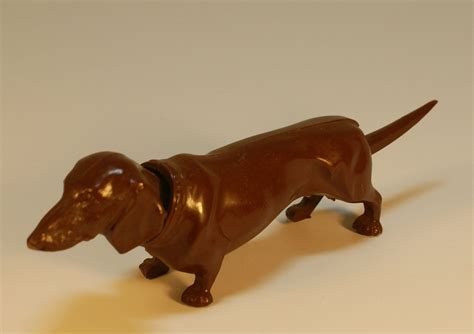 Search for a puppy or dog. Germany Dachshund weiner dog nodder head and tail WAGS doxie figurine | Dachshund, Dogs, Heads ...