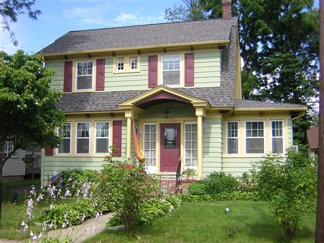 Charming white colonial revival house. Dutch Colonial Revival. Like the colors - but would like ...
