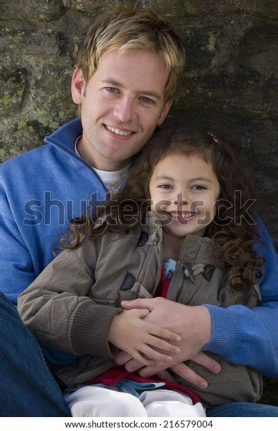 Smiling Father Hugging Daughter Stock Photo 216579004 Shutterstock