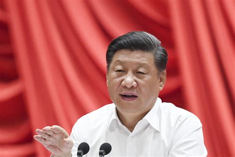 The portrait of xi jinping hangs at the center of the wall in the church, propaganda slogans. Xi Jinping rallies China for decades-long 'struggle' to ...