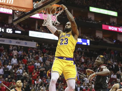 The los angeles lakers star was at his son bronny's game and jumped into the layup line for a huge dunk. Why LeBron James Should Call Himself the GOAT | Complex