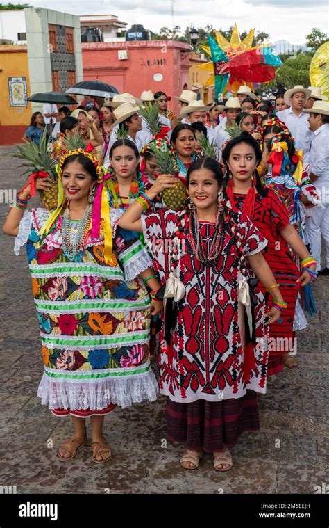 The Flor De Piña Dancers From San Juan Bautista Tuxtepec In A Parade At The Guelaguetza Festival