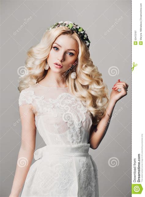 Portrait Of A Beautiful Young Blonde Woman With Long Curly ...