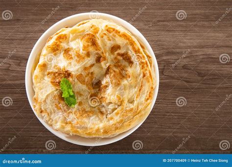 Roti Parata Or Roti Canai With Lamb Curry Sauce Stock Image Image Of