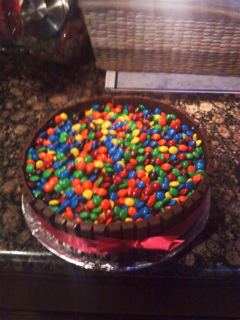 This Is A Mandms Cake You Make A Regular Round Cake And Put Kit Kats