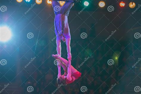 Aerial Acrobats Perform Under The Circus Dome Editorial Stock Photo