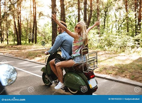 Loving Couple Man On Scooter With Girlfriend Outdoors Stock Image Image Of Nature Male 98193233