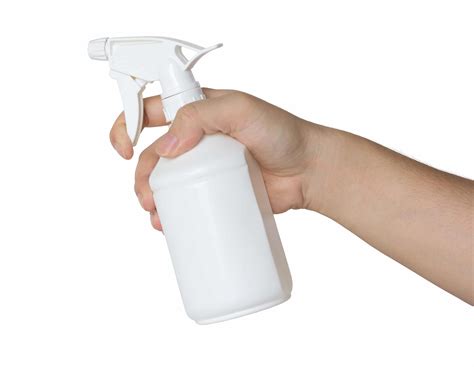 Hand Holding A Spray Bottle Isolated On White Pioneer Packaging