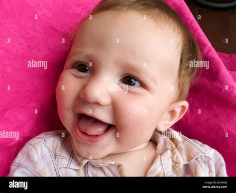 Happy Laughing Six Month Baby Boy Stock Photo Alamy
