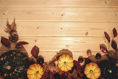 Happy Thanksgiving Day With Pumpkin And Nut On Wooden Background