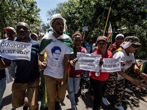 Photos Thousands Take Zimbabwes Capital Calling For Mugabes Ouster