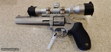 Used Taurus Tracker 17 Hmr Stainless With Black Grips Includes Long