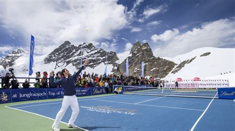 Tennis Star Roger Federer And Olympic Skiier Lindsey Vonn Play Tennis