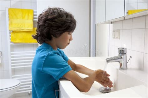 Little Boy Washing His Hands Stock Photo Image Of Water Years 34667274