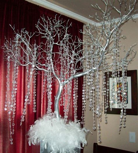 Once they have added their sentiment they simply tie their leaf or leaves onto the centerpiece branches. by using a tree branch centerpieces life more romantic fantastic branch wedding centerpieces ...