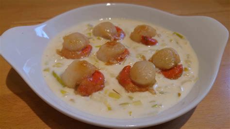 Noix de St Jacques sa fondue de poireaux