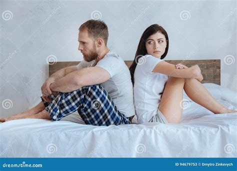 millennial couple sitting on bed after argument stock image image of divorce population 94679753