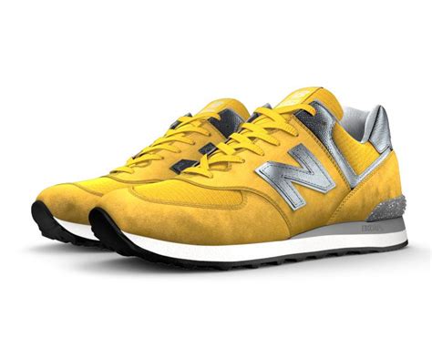 A Pair Of New Balance Shoes With Yellow And Black Accents On The Upper