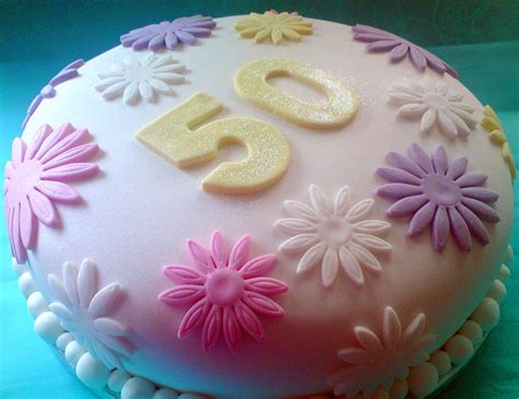By b.jiet homemade cake house · updated about 3 weeks ago. Pastel flower covered 50th birthday cake | A simple ...