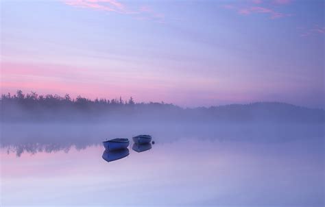 Landscape Photo Of Two Jon Boat On Body Of Water Surrounded By Fogs