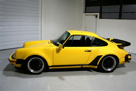 It is a fully optioned porsche 911 turbo with a pdk gearbox and sports exhaust as standard. 1989 Porsche 930 PTS Ferrari Fly Yellow 62,036 miles | Sloan Cars