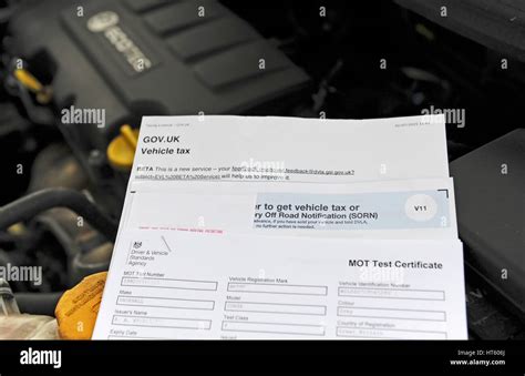 Uk Vehicle Mot Test Certificate And Tax Renewal Form Stock Photo Alamy