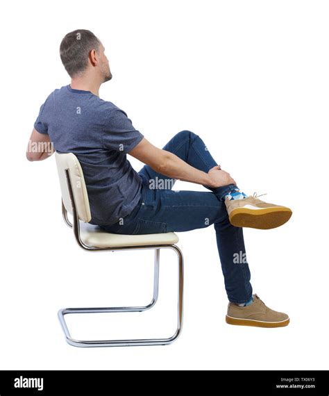Side View Of A Man Sitting On A Chair Rear View People Collection The