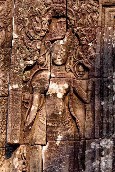 Stone Carvings On The Walls Of The Bayon Temple In Angkor Thom Stock