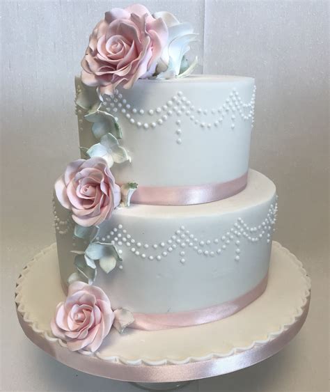 Carlie 2 Tier Cake With Piped Dotted Loop Detail And Gentle Flower Cascade Tortas De